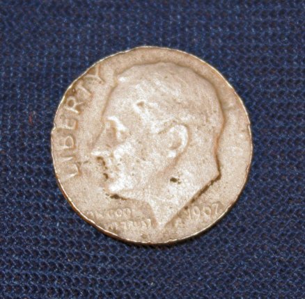 Possible-Roosevelt-Dime-On-A-Foreign-Planchet