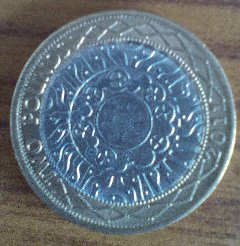 Fake-�2-Coins-Found-In-Change