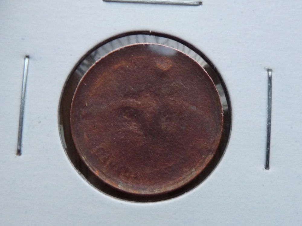 1967-Cent---Struck-Through-Die-Cap?