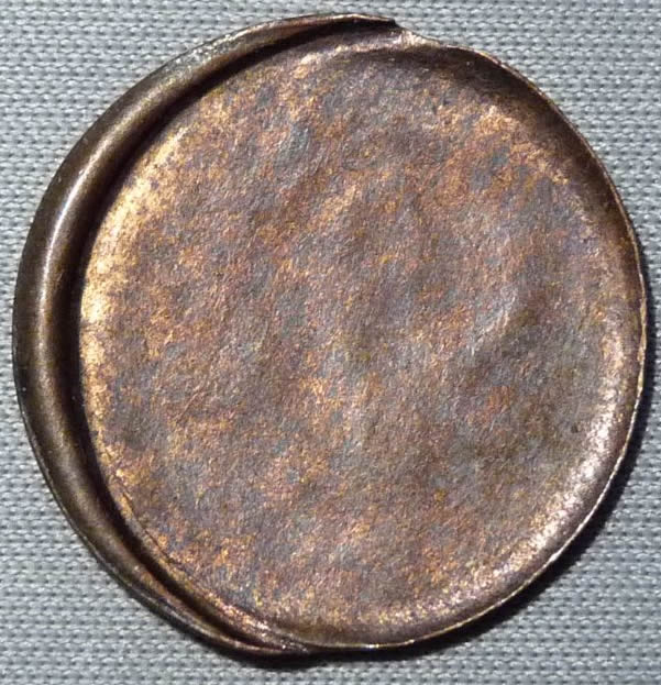 Cent-Offstruck-Through-A-Die-Cap?