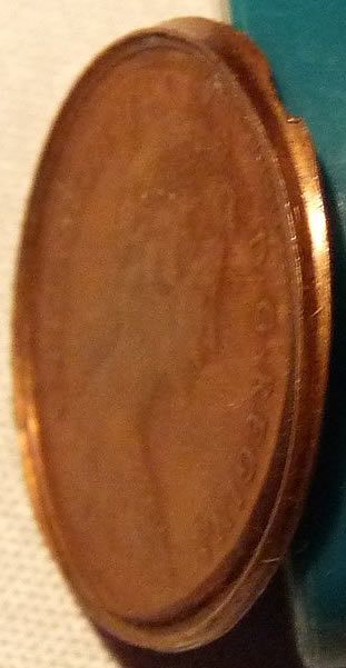 Cent-Offstruck-Through-A-Die-Cap?