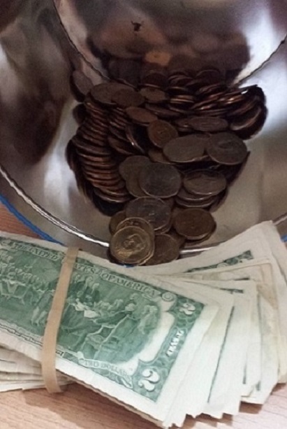 Guess-The-Amount-In-The-Tin-Can?