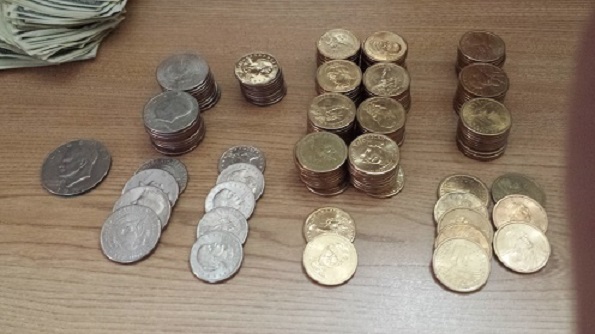 Guess-The-Amount-In-The-Tin-Can?