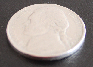 Mule-Error-Nickel:-Two-Jefferson-Faces-1999-P-And-2001-P-Minted-Coin.