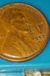 IV-Stamped-On-A-Wheat-Penny.
