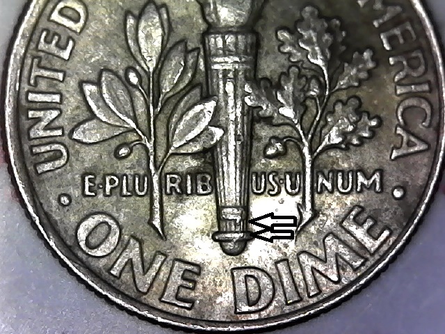 2007-P-Dime-With-Broken-Band-And-Tear-Drop-Like-At-The-Base-Of-The-Torch.