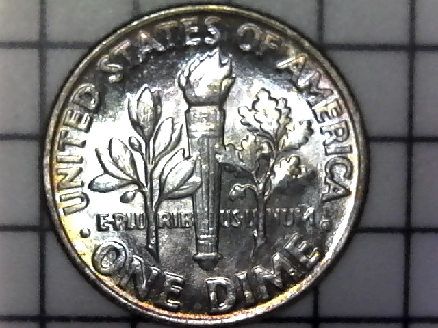 1964-Roosevelt-Dime-With-Multiple-Spreading-Of-Letters-In-The-Reverse.