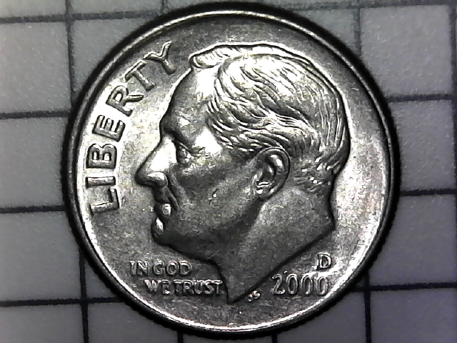 2000-D-Dime-With-Something-Extra-In-The-Torch-Band.