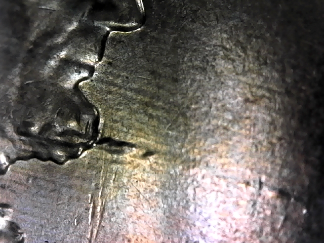 2014-D-Lincoln-Penny-With-Something-Protruding-From-His-Beard.