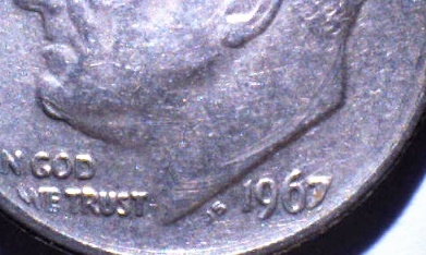 Post-Mint-Damage-On-A-1967-Dime?