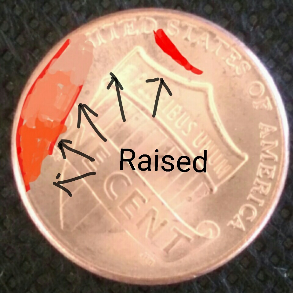 Whats-This-Mark-Is-On-The-Obverse-And-Reverse-Of-A-2018-D-Lincoln-Cent