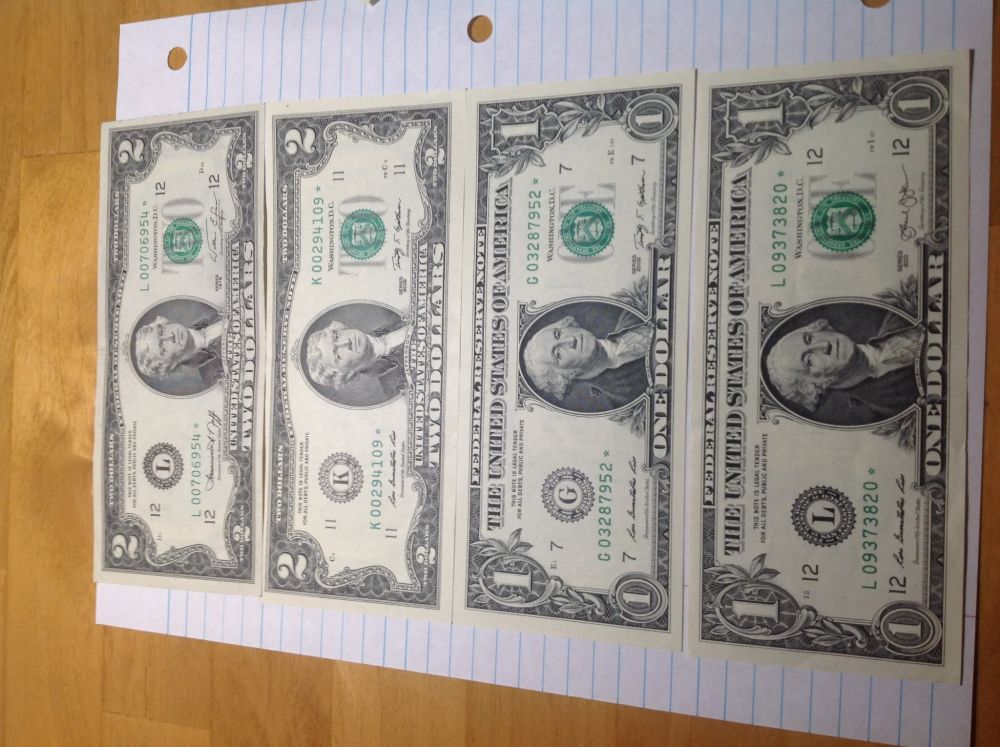 Marking-The-200th-Post-With-World/Us-Banknotes