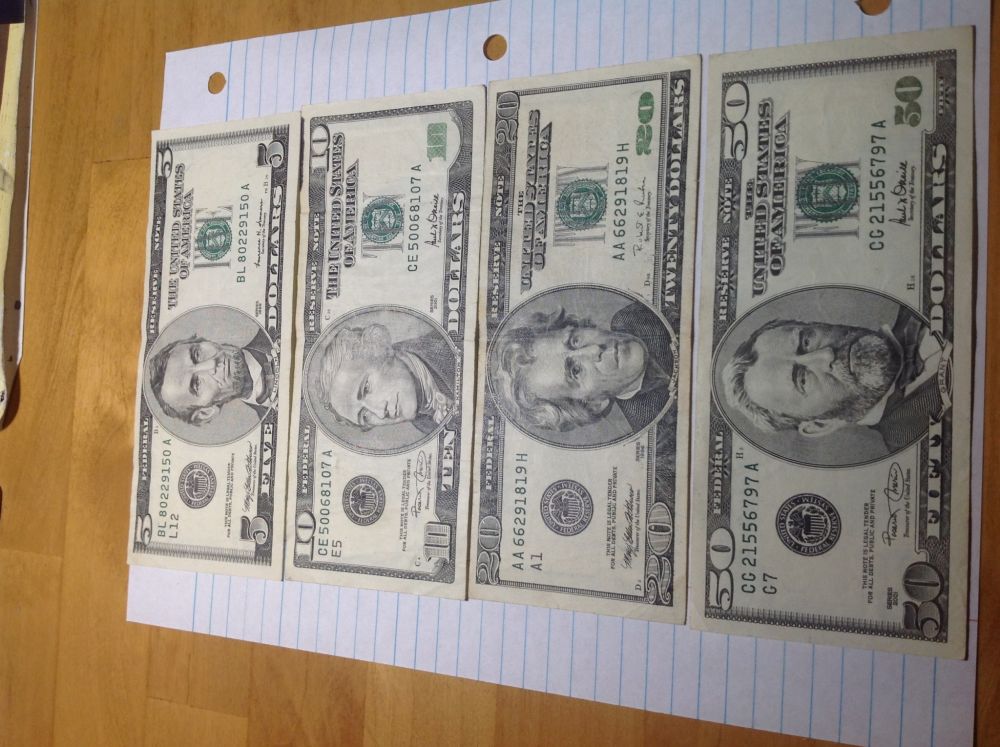 Marking-The-200th-Post-With-World/Us-Banknotes