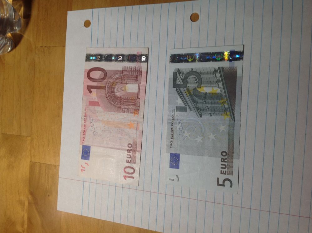Marking-The-200th-Post-With-World/Us-Banknotes