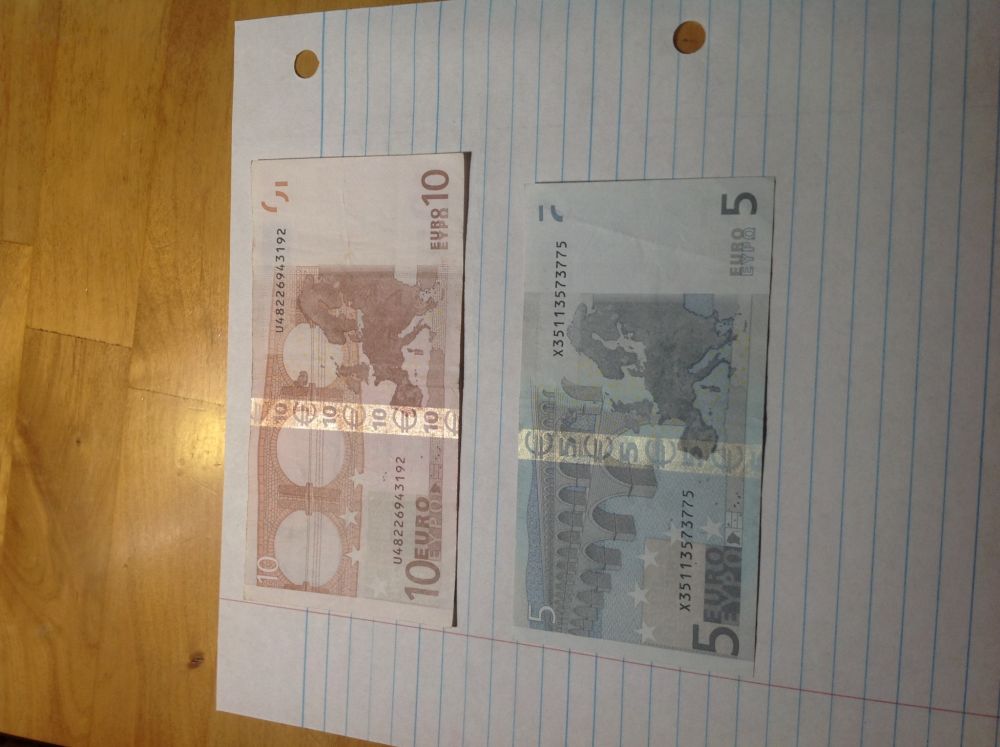 Marking-The-200th-Post-With-World/Us-Banknotes