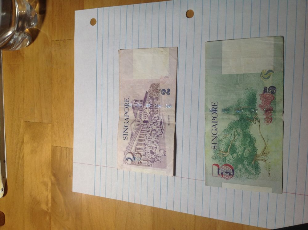 Marking-The-200th-Post-With-World/Us-Banknotes