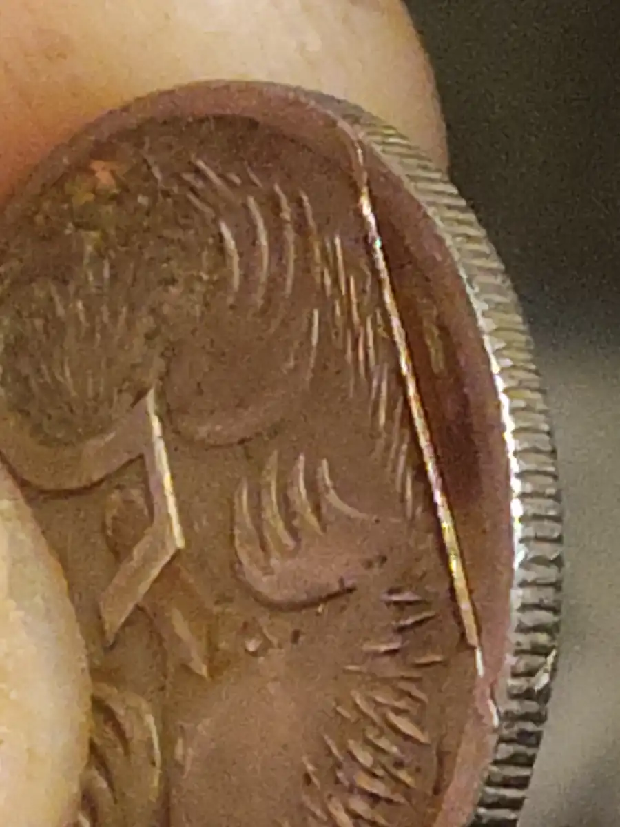 2001-5c-Coin-With-A-Line-Across-It