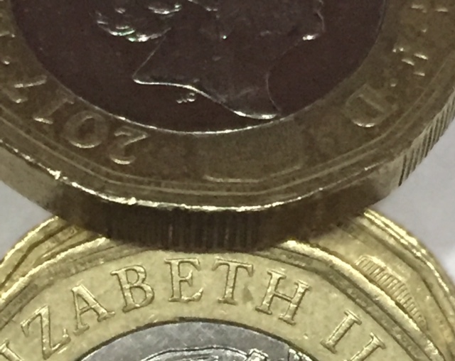 A-Couple-Of-GB-£1-Coins-With-Errors