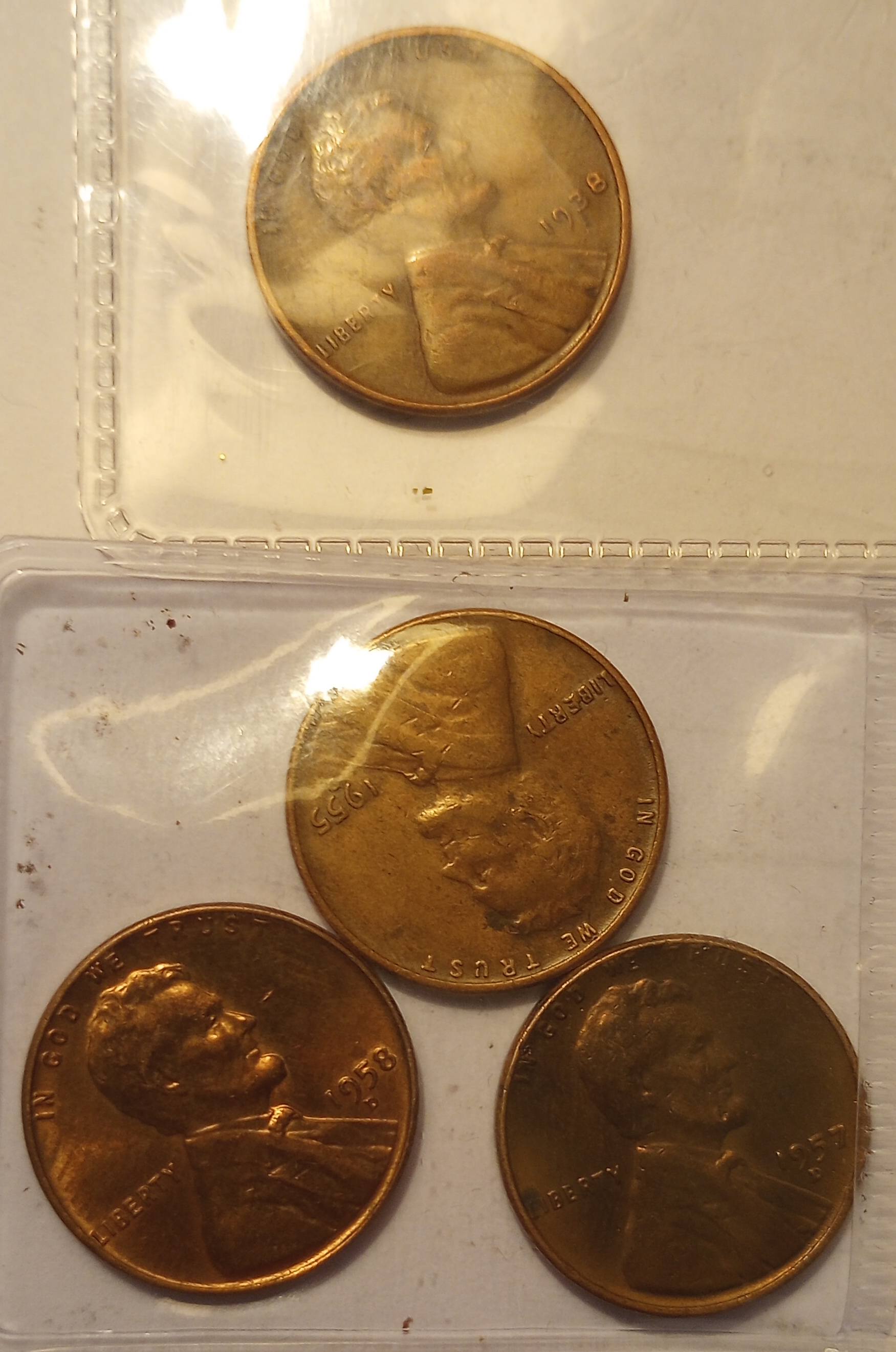 Collection-Of-Wheat-Pennies-And-SBA-Dollars