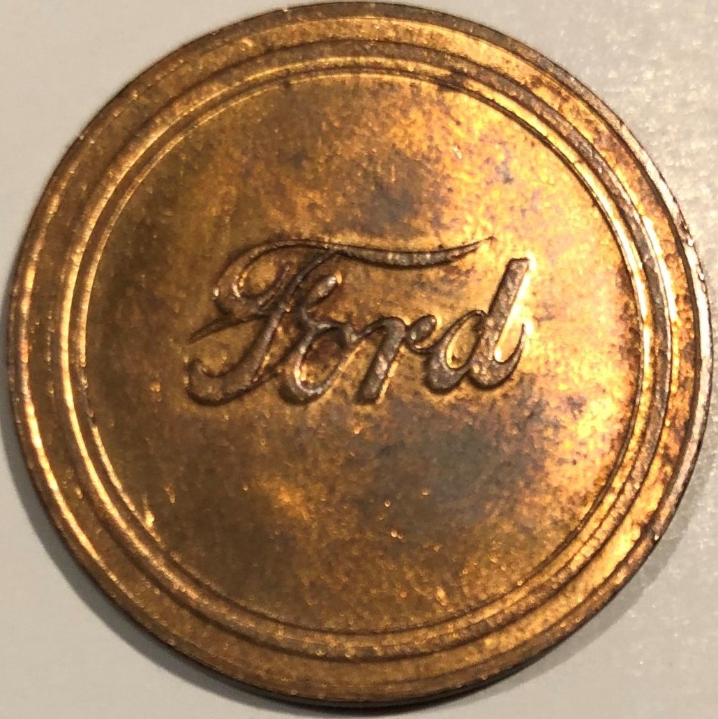 Ford-Motor-Company-Copper-Coin-Dated-1909.--Ford-Model-T-On-Back