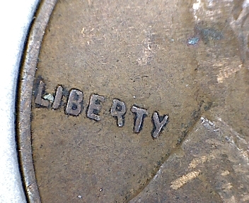 1936-Penny-Missing-Part-Of-R