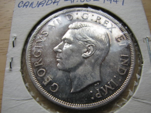 1948-Versus-1947-Maple-Leaf-$1---What's-The-Deal?