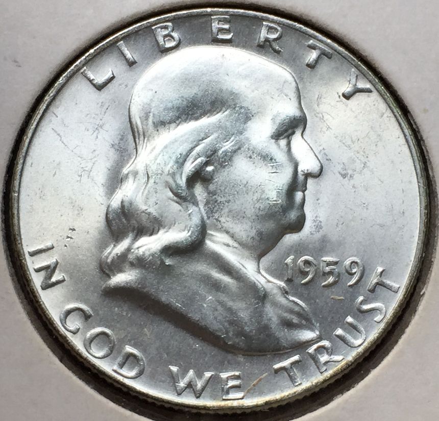 1959-D-Franklin-Half-Dollar---Raised-Metal-On-Date