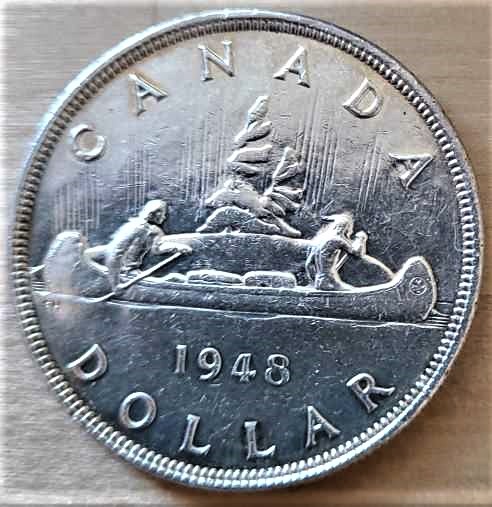 Help-With-Authenticating-This-1948-Silver-Dollar?