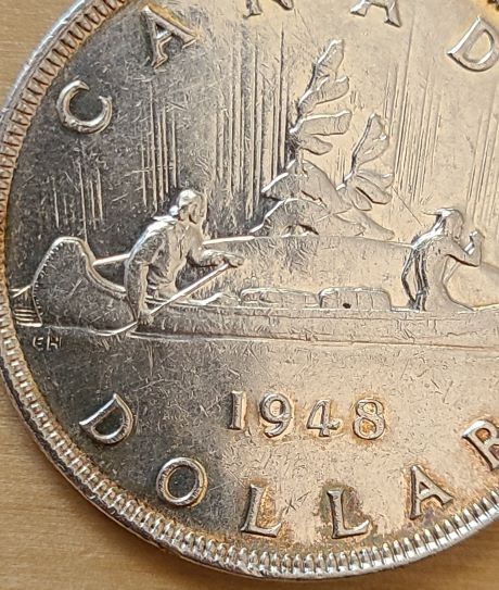 Help-With-Authenticating-This-1948-Silver-Dollar?