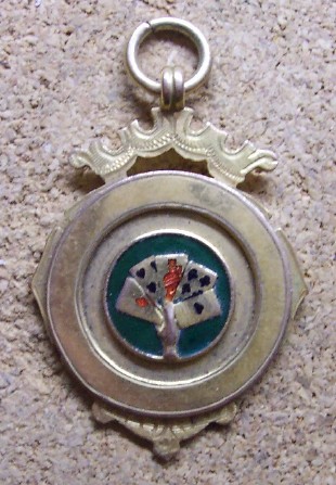 Badge:-Hand-Of-Cards,-1922-23-Winners