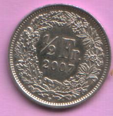 2007-Swiss-1/2-Fr-Found-With-UK-5-Pence-Coins