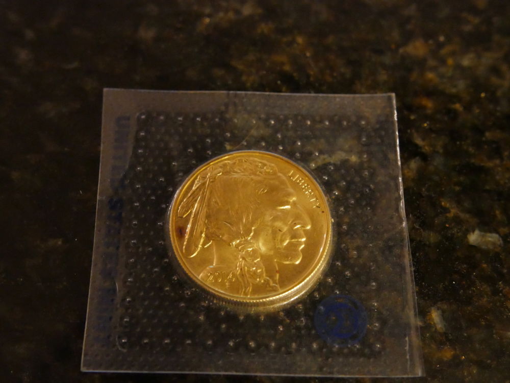 Pink-Spotting-On-Gold-Buffalo-Coin