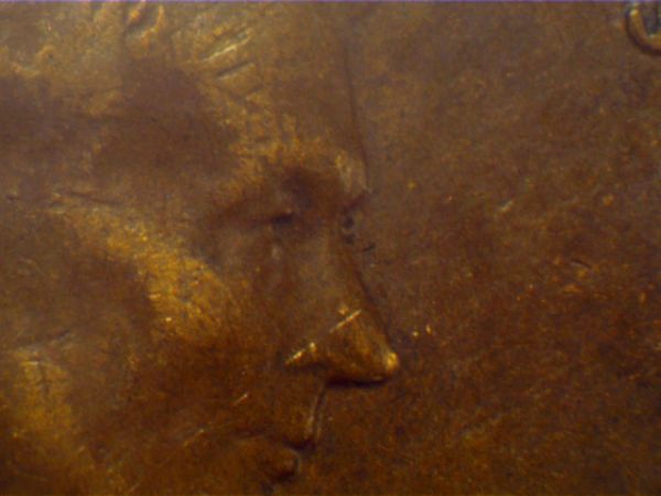 1958-Penny-Two-Eyes-Are-Seen-In-Profile,-Please-Confirm