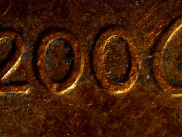 2006-Penny,-Part-Of--Design,-Damage-Or-Ear-Lobe-?