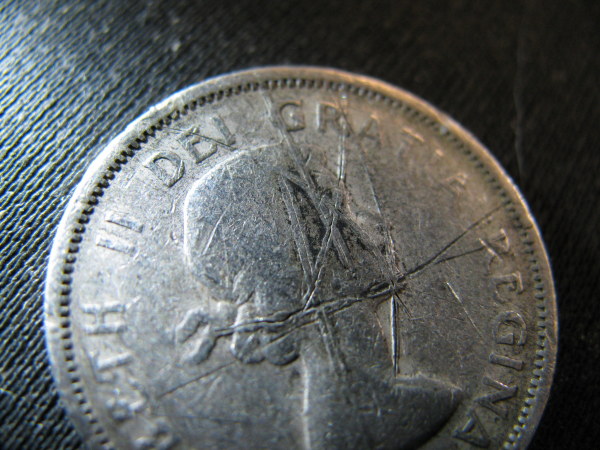 1955-Quarter-What-Happen-Here?
