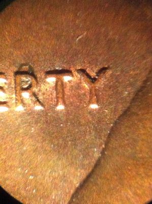 1982-LMC-With-An-O-Above-And-Through-The-Are-In-Liberty