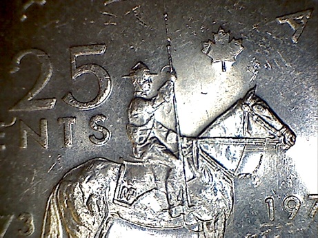 1973-25c-RCMP-Large-Bust-Circulated---Grade-Opinion-Please?