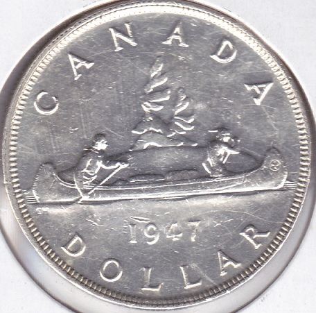 1947-Silver-Dollar-Pointed-7-Dhp---How-Would-You-Grade-This?