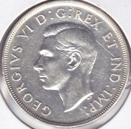 1947-Silver-Dollar-Pointed-7-Dhp---How-Would-You-Grade-This?