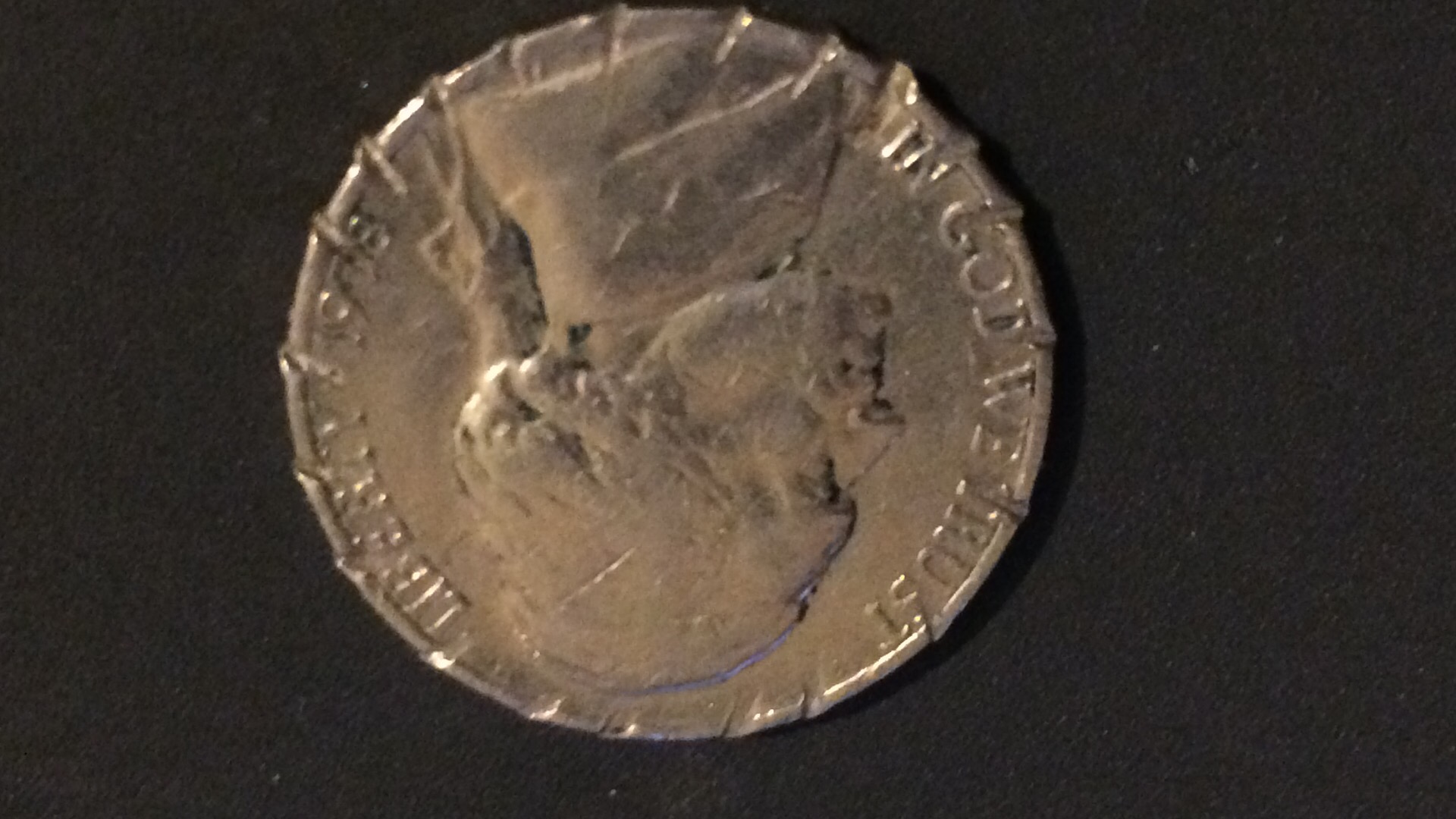 Nickel-Coin-With-Spiral-Cut-Sides