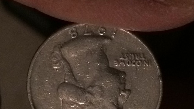 Quarter-Coin-With-2-Circles-Looks-Like-Ood