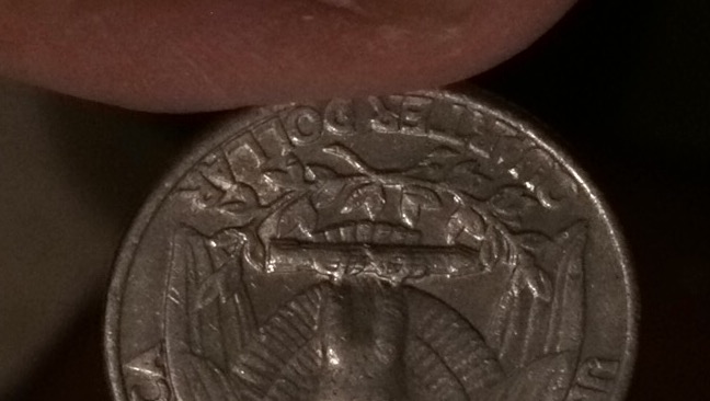 Quarter-Coin-With-2-Circles-Looks-Like-Ood