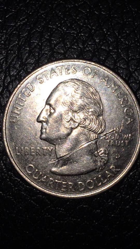 Quarter-Dollar-1999-Cut-On-Neck-Of--George-Washington