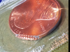 2006-Lincoln-Cent-In-Cello---What-Type-Of-Error?