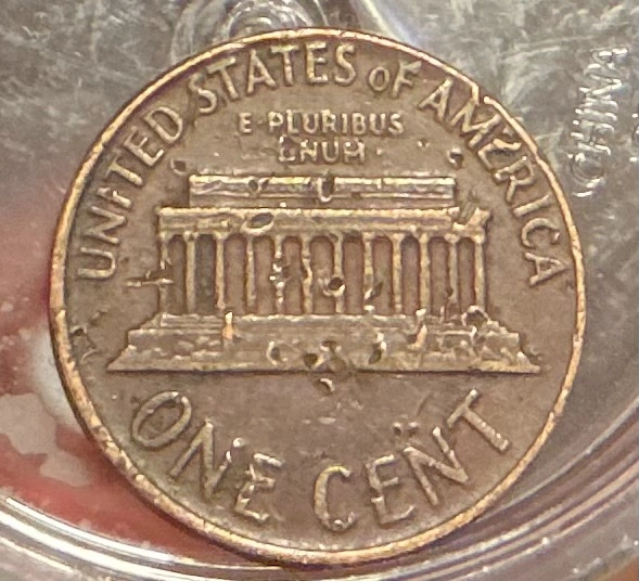 Post-Mint-Damage-Vs-Strike-Error-On-1965-Penny?