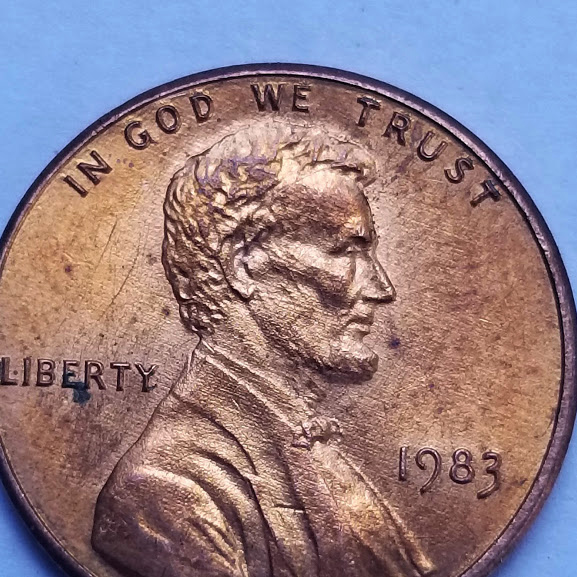 1983-Penny-With-Some-Die-Cracks-And-Something-