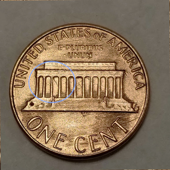 1983-Penny-With-Some-Die-Cracks-And-Something-