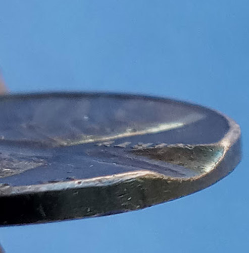 1981-D-Possible-Rolling-Indentation-Witt-Bowtie-Web-Scrap?