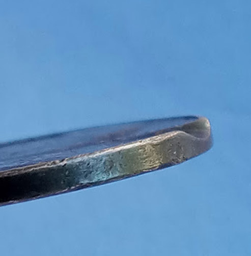 1981-D-Possible-Rolling-Indentation-Witt-Bowtie-Web-Scrap?