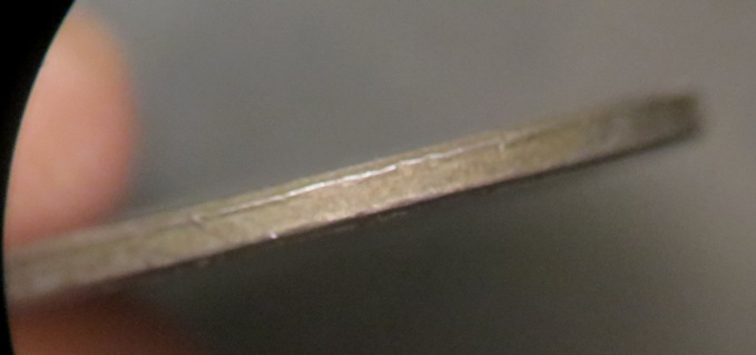 2001-LMC-Unplated-Planchet-Or-Coated?